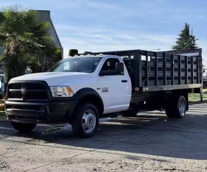 Camión de plataforma plana RAM 4500 usado de 2015, listo para trabajar, con plataforma elevadora Waltcoo y plataforma de 16 pies, LHD/RHD, envío a todo el mundo - Product Image 1