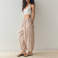 Pantalon de survêtement décontracté beige en molleton de coton pour femme, coupe ample, taille élastique, longueur cheville, style printemps, couleur unie, effet délavé vintage, avec poches