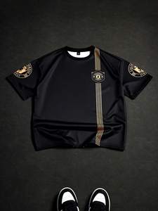 เสื้อเจอร์ซีย์อเมริกันฟุตบอลลายสิงโตสีทองแบบโอเวอร์ไซส์ ผ้าตาข่าย สำหรับฝึกซ้อม เสื้อผ้ากีฬาสีดำสุดหรู รับผลิตแบบ OEM ODM - Product Image 4