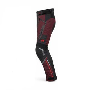 Pantalones de invierno para motociclistas con construcción impermeable, forro polar, zonas de rodilla reforzadas, puños ajustables y tela resistente. - Product Image 2