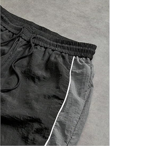 กางเกงขายาวลำลองผู้ชายสไตล์สตรีท ใส่สบาย น้ำหนักเบา ทรงหลวม ขากว้าง ผ้าไนลอน แต่งแถบสะท้อนแสง - Product Image 6