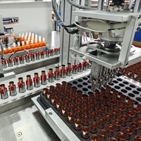 Machine d'assemblage de tubes à rouge à lèvres entièrement automatique QFW avec PLC, machine d'assemblage de baumes à lèvres/étuis à rouge à lèvres cosmétiques