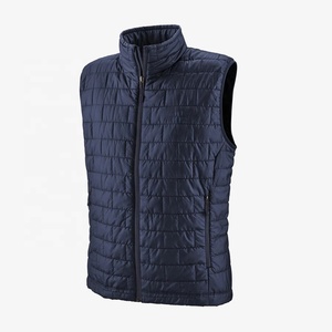 Chaleco acolchado de talla grande de tendencia superior para hombre, chaqueta de tela de poliéster cálida de invierno con cierre de cremallera, logotipo personalizado, varios colores sólidos - Product Image 4