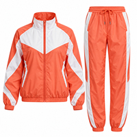 Ensemble court 2 pièces streetwear à capuche en nylon/coton, avec empiècements color block, logo et lacets sur toute la longueur – Nouvelle collection très prisée