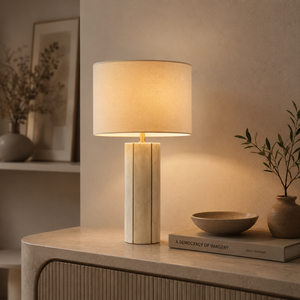 Lámpara de mesa de mármol de alta gama que exhibe una geometría cilíndrica suave, textura de mármol natural auténtica e iluminación ambiental superior. - Product Image 1