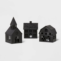 Schwarze Hausförmige Plastik-Weihnachtslaternen Traditionelle Feiertagsdekoration mit Ausschnittfenstern und Dachdetails
