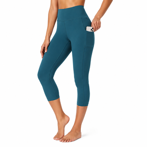 High Waisted Calf-Length Yoga <b>Leggings</b> With <b>Pockets</b> Four-Way Stretch Seamless Solid Color Women's Workout Pants - Product Image 5