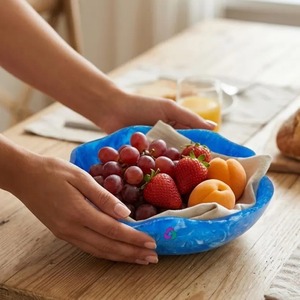 Resin serving bowl with contemporary design elegant finish suitable for showcasing desserts snacks salads or festive food - Product Image 1