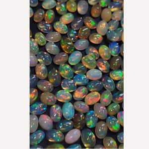 1325 piezas de ópalo etíope natural con fuego, cabujón ovalado de 6x4mm, 423 quilates, Iroc Sales, gemas sueltas de buena calidad, US$339 en total - Product Image 1