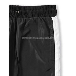 Personnalisez Votre Propre Marque de Pantalon Coupe-Vent Casual pour Hommes avec Logo Personnalisé Tissu Nylon Léger Écologique et Respirant - Product Image 6