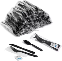 Umwelt freundliches schweres, schwarz-weiß verpacktes Einweg-Plastik messer und-gabeln Besteckset mit Serviette.