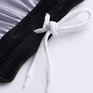 ชุดบาสเก็ตบอลแบบซับลิเมชั่นสีดำ เทา แดง ลายซิกแซก พร้อมกางเกงขาสั้น ชุดกีฬาทีม OEM - Product Image 6