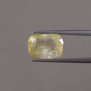 ไพลินสีเหลือง ได้รับการรับรองจาก IGI เกรด AAA พลอยแท้ธรรมชาติ ขนาด 12x9 มม. รูปทรงคุชชั่น น้ำหนัก 7.06 กะรัต แบบเม็ดเดี่ยว เปลี่ยนสีได้ ผ่านการเคลือบน้ำมัน - Product Image 1