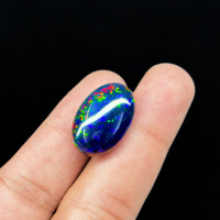 Opale noire d'Éthiopie naturelle – Cabochon ovale en forme de nid d'abeille (18,75 carats)