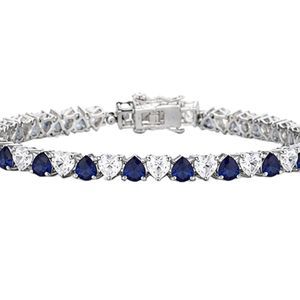 Elegante pulsera de tenis en oro blanco de 18 quilates con piedras de corte pera azul real alternadas y diamantes blancos brillantes, diseño de lujo. - Product Image 1