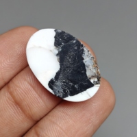 Cabochon ovale en buffle blanc pour la fabrication de bijoux 24x17x4 mm. 13 Ct. E1243