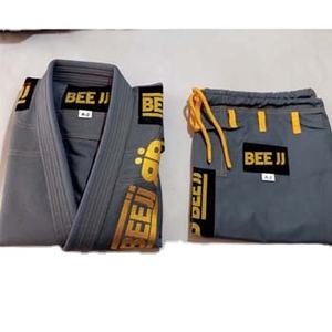 Venta caliente 12OZ White Karate Gi Traje de artes marciales de algodón ligero de alta calidad para entrenamiento de karate - Product Image 6