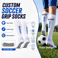 Chaussettes de football personnalisées à forte valeur ajoutée Chaussettes à prise en main d'usine Chaussettes antidérapantes