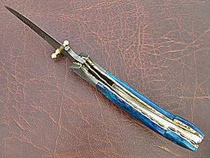 Couteau de chasse tactique en acier Damas, couteau de survie d'extérieur de qualité industrielle 58HRC, lame pleine longueur, système de verrouillage à ressort, OEM B/B - Product Image 5