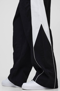 Pantalon baggy en nylon haute performance, conçu pour une liberté de mouvement maximale et un confort durable. - Product Image 3