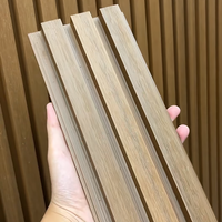 Panneaux muraux décoratifs imperméables et résistants au soleil en bois-plastique pour villas de vacances