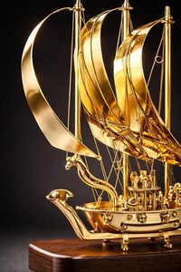 Modèle de bateau à voile artisanal en métal Golden Horizon avec base en bois, décoration nautique de luxe pour la maison, finition dorée - Product Image 2