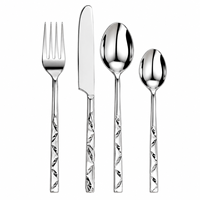 Ensemble de couverts en acier inoxydable à texture géométrique, finition miroir, style moderne, pour la restauration fine et la décoration d'hôtel