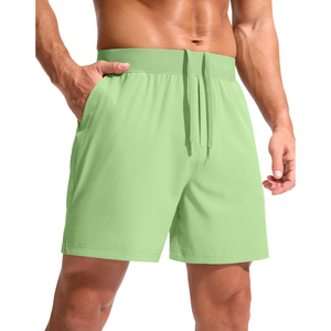 Shorts de sport pour homme, vert uni, séchage rapide, taille élastique, longueur mi-cuisse, style décontracté, polyester - Product Image 1