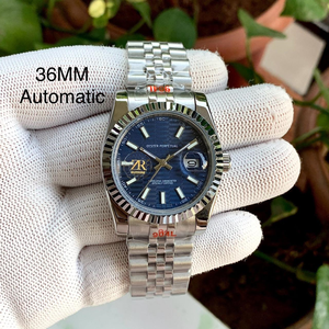 นาฬิกาหรูหราขนาด 36 มม. ระบบออโตเมติก รุ่นลิมิเต็ดอิดิชั่น คุณภาพสูง หน้าปัดลายฟลูเต็ดสีน้ำเงิน ขอบตัวเรือนลายฟลูเต็ด กระจกแซฟไฟร์ - Product Image 1