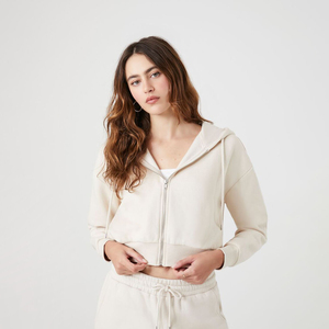 Vente en gros de sweats à capuche zippés pour femmes, personnalisables avec logo, de haute qualité, en polaire douce, coupe oversize, style lounge, avec cordon de serrage et coupe courte - Product Image 1