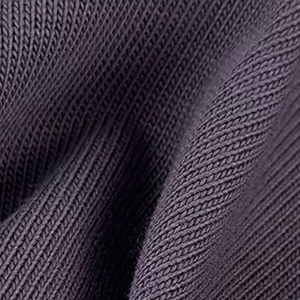 Tissu jersey uni extensible de haute qualité avec logo personnalisé ODM et couleur unie, matériau de mode en vrac pour usine - Product Image 1