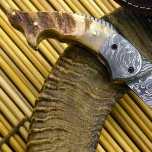 Cuchillo de caza de acero de Damasco con hoja de punta caída y mango de hueso, con perilla de apertura para el pulgar, para uso en camping y actividades al aire libre. - Product Image 6