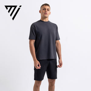 Camiseta al por mayor OEM de primera calidad 100% algodón para hombre, nuevo diseño, logotipo personalizado, cuello redondo, hombros caídos, talla grande. - Product Image 1