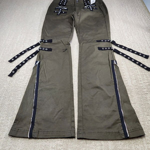Pantalon évasé en jean vert olive pour femme, détails lacés, fermetures éclair latérales, taille haute, coupe ample, longueur cheville, motif géométrique, style vintage - Product Image 1