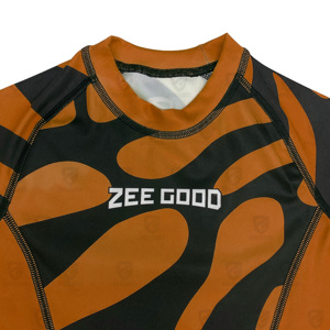 Vente en gros de rashguards pour enfants respirants, ajustés, imprimés, à manches courtes, pour MMA, avec logo personnalisé, UPF50+, séchage rapide, pour l'entraînement en salle de sport - Product Image 3