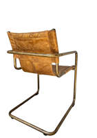 Chaise de salle à manger en cuir avec design ergonomique, structure tubulaire en métal, rembourrage haut de gamme, portable et légère pour salle à manger moderne