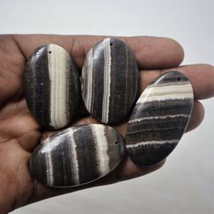 2024 venta al por mayor de cabujón de calcita de cebra natural hecho a mano piedras preciosas de corte ovalado suelto varios tamaños y formas con taladro - Product Image 1