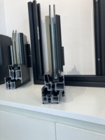 Porte à battant HOLCOM en alliage d'aluminium français de haute qualité, double vitrage trempé, certifiée NFRC, usage résidentiel, isolante thermiquement