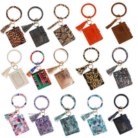 Portefeuille-bracelet élégant et accrocheur en silicone personnalisé avec porte-cartes en cuir et porte-clés pour femme