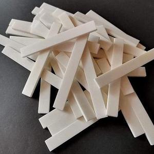 Nut de guitare en os de buffle de qualité supérieure, blanchi et non blanchi, pour améliorer le son et l'action des instruments, à prix abordables. - Product Image 1