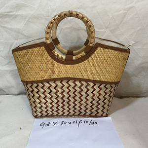 Été 2023 Nouveau design Hollow Out Rattan Straw Bag High-class Female Beach Basket Bag - Product Image 5