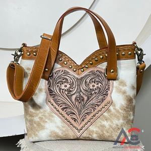Sac fourre-tout en cuir repoussé style occidental fait main avec fourrure de vache, nouveau design de luxe en forme de cœur, sacs à bandoulière pour femmes 2026 - Product Image 1