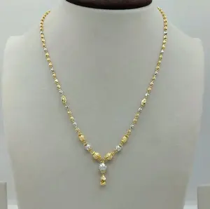 Collier élégant bicolore en perles dorées avec accents argentés texturés et pendentif goutte, design traditionnel pour femme - Product Image 1