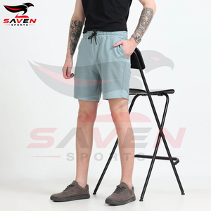 Pantalones cortos para hombre de color azul menta liso, transpirables, con logotipo propio, tela suave al tacto, con cordón en la cintura y bolsillos, estilo casual. - Product Image 5