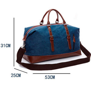 Blue Canvas Travel Duffel Bag With Brown Leather Trim And Adjustable Straps Fashionable Durability Feature - Product Image 5