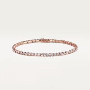 Bracelet tennis rond en or rose de luxe avec diamants pour femme, bijou élégant et minimaliste, idéal pour les soirées chics. - Product Image 2
