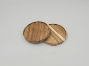 Ensemble de deux dessous-de-verre ronds en bois naturel, design circulaire - Product Image 1