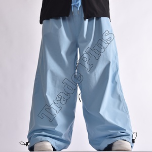 Pantalon de neige imperméable bleu clair de qualité supérieure avec taille à cordon de serrage, doublure chaude pour l'hiver, ourlet réglable et design ample - Product Image 1