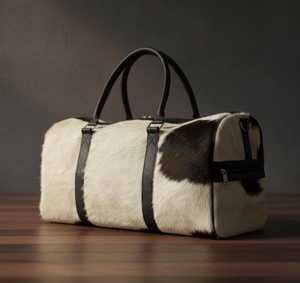 กระเป๋าเดินทางหนังแท้ลายขนสัตว์สุดหรู กระเป๋าหนังวัวแบบถือสะพายสำหรับเดินทางช่วงสุดสัปดาห์ กระเป๋าเดินทางขึ้นเครื่องบิน OEM ส่งออกจำนวนมาก LHTB-0102 - Product Image 4