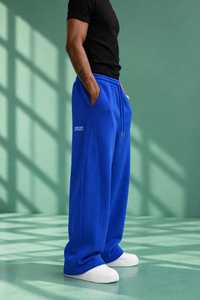 Pantalon de survêtement bleu pour homme, coupe large, taille élastique, style streetwear décontracté, avec bande latérale blanche, respirant, léger, avec cordon de serrage - Product Image 5